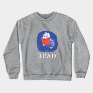 Boy Reading in Blue Crewneck Sweatshirt